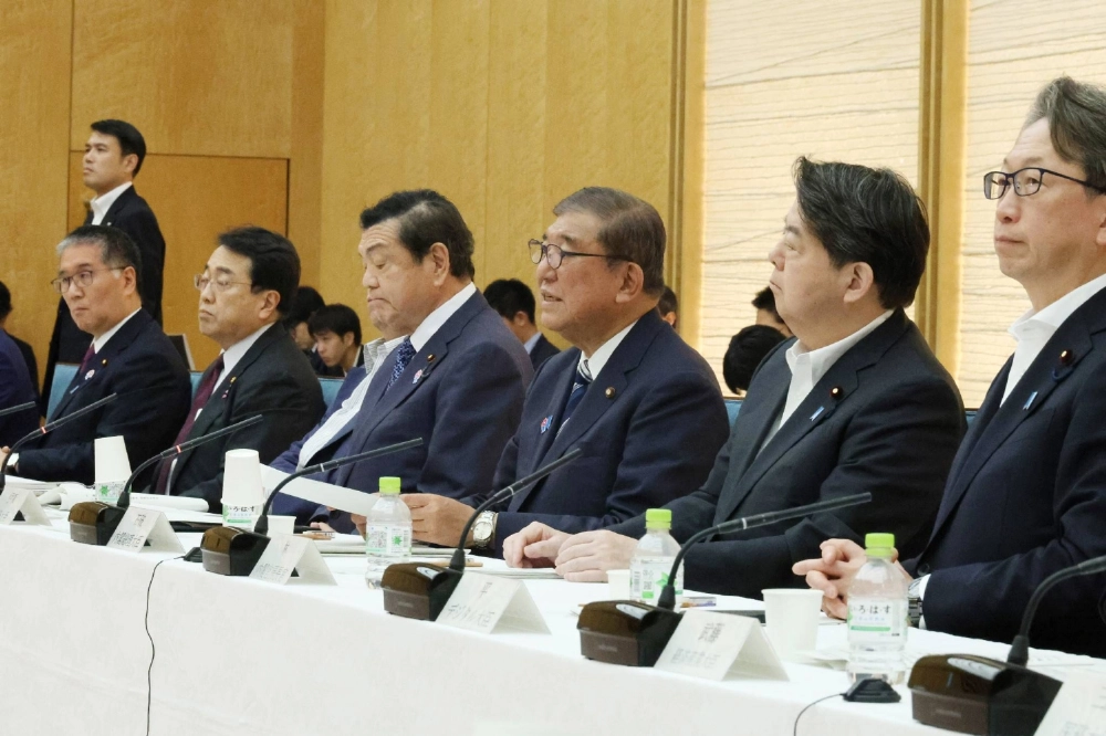 Prime Minister Shigeru Ishiba (center) speaks at a meeting of the government's Headquarters for Creating New Regional Economies and Living Environments on Tuesday. Prime Minister Shigeru Ishiba (center) speaks at a meeting of the government's Headquarters for Creating New Regional Economies and Living Environments on Tuesday.