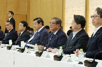 Prime Minister Shigeru Ishiba (center) speaks at a meeting of the government's Headquarters for Creating New Regional Economies and Living Environments on Tuesday. | JIJI