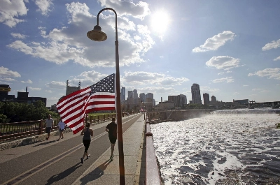 A pedestrian bridge that crosses the Mississippi River in Minneapolis A pedestrian bridge that crosses the Mississippi River in Minneapolis