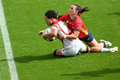 Japan flanker Iroha Nagata attempts to score a try against Spain during the Women's Rugby World Cup in York, England, on Sunday. Japan flanker Iroha Nagata attempts to score a try against Spain during the Women's Rugby World Cup in York, England, on Sunday.