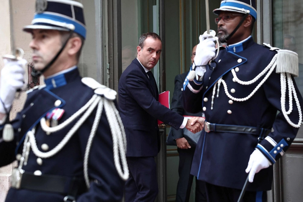France's new Prime Minister Sebastien Lecornu arrives for a meeting at a hotel in Paris on Wednesday. France's new Prime Minister Sebastien Lecornu arrives for a meeting at a hotel in Paris on Wednesday.