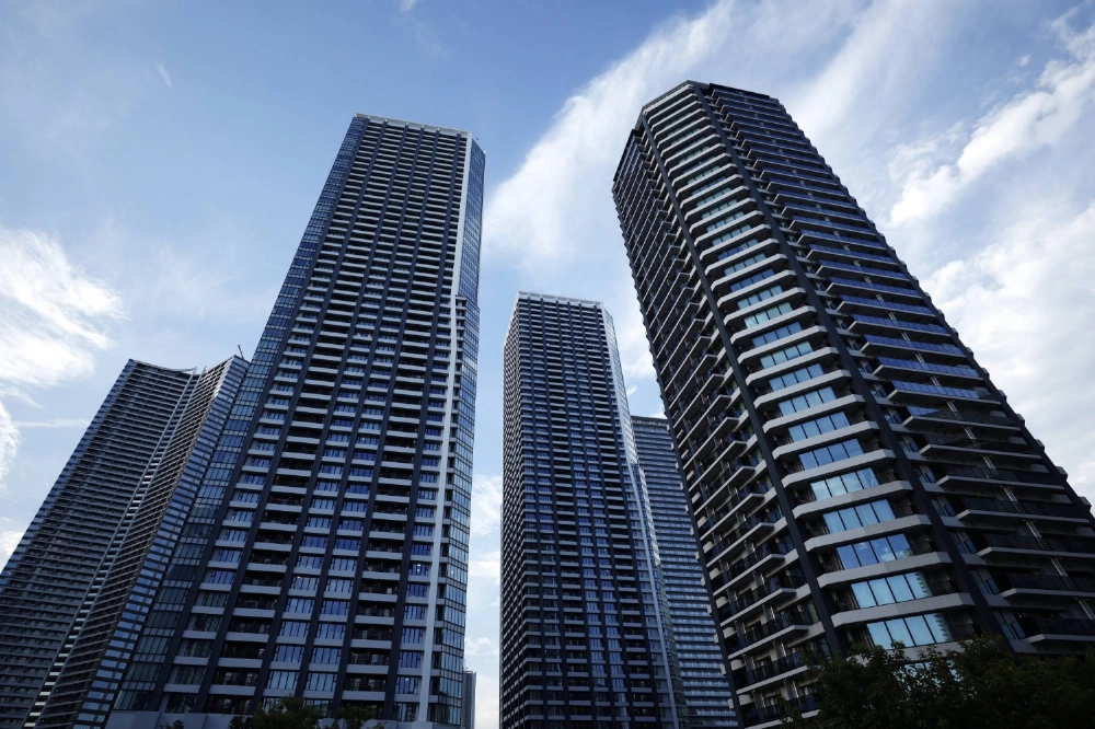 Residential buildings in the Harumi district of Tokyo. Condominium associations have started to invest in bonds to try and keep pace with inflation.  Residential buildings in the Harumi district of Tokyo. Condominium associations have started to invest in bonds to try and keep pace with inflation.