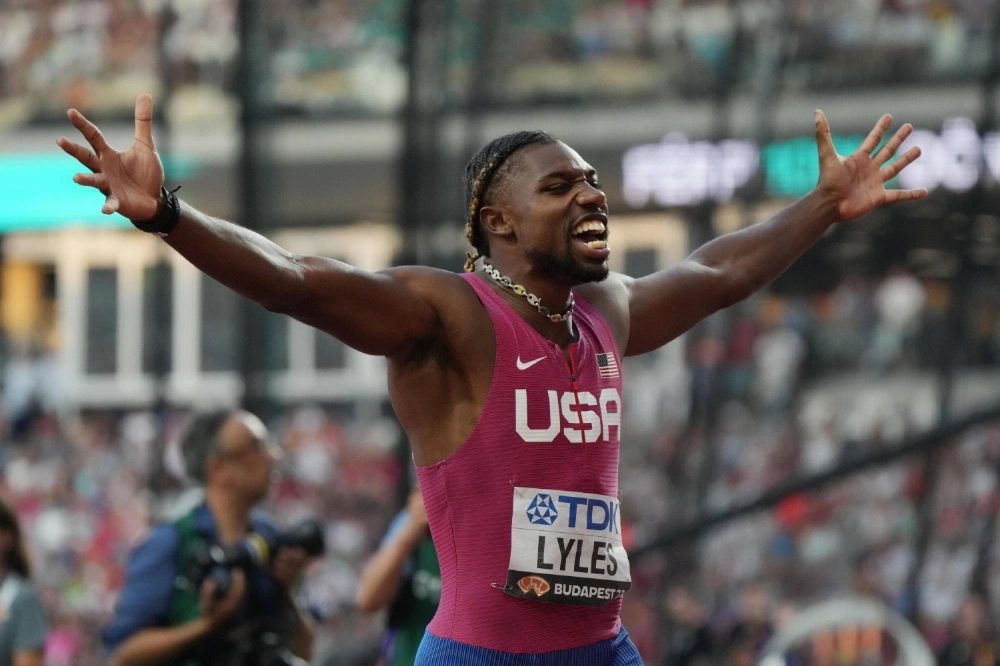 Noah Lyles celebrates after winning the 100-meter final at the world championships in Budapest on Aug. 20, 2023. Noah Lyles celebrates after winning the 100-meter final at the world championships in Budapest on Aug. 20, 2023.