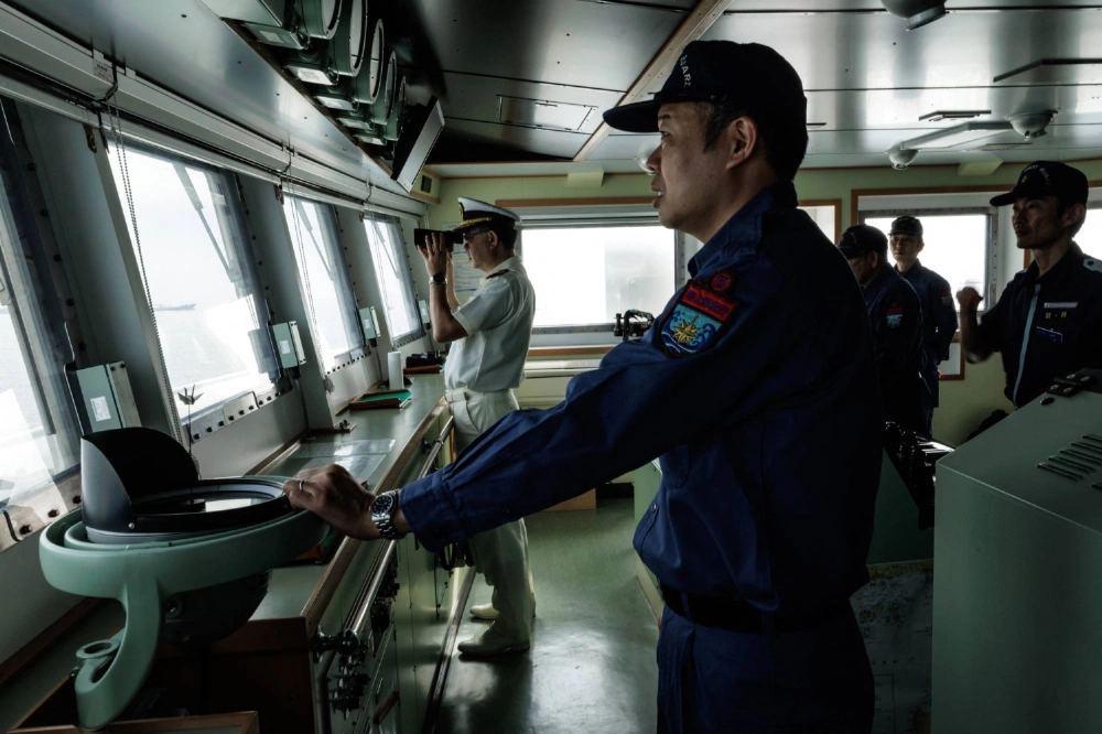 Japan Coast Guard officials take part in joint antipiracy exercises with the Indonesia Coast Guard, held off the coast of Jakarta in January. Japan Coast Guard officials take part in joint antipiracy exercises with the Indonesia Coast Guard, held off the coast of Jakarta in January.