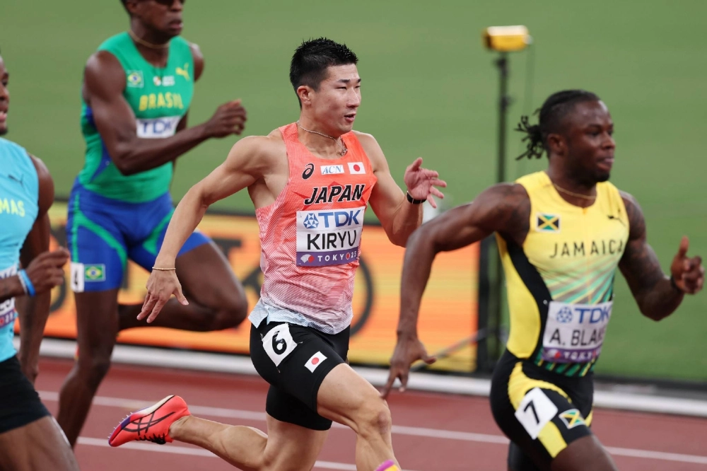 Yoshihide Kiryu competes in the men's 100-meter heats on Day 1 of the World Athletics Championships at Tokyo's National Stadium on Saturday.  Yoshihide Kiryu competes in the men's 100-meter heats on Day 1 of the World Athletics Championships at Tokyo's National Stadium on Saturday.
