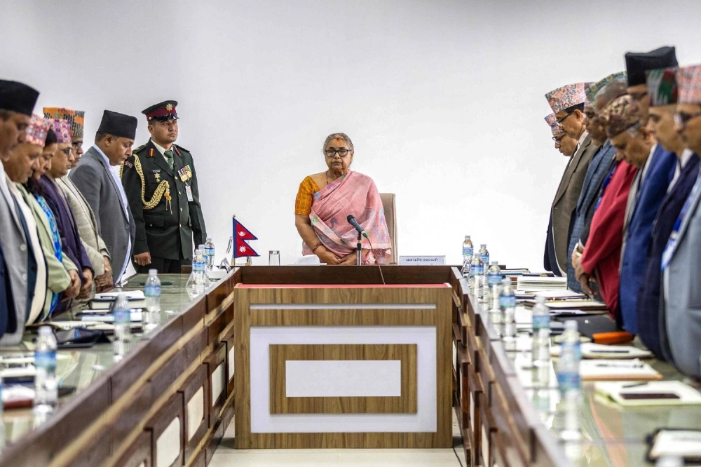 Newly-elected prime minister of Nepal's interim government, Sushila Karki, and other officials observe a moment of silence on Sunday to pay tribute to those who lost their lives in recent protests in Kathmandu. Newly-elected prime minister of Nepal's interim government, Sushila Karki, and other officials observe a moment of silence on Sunday to pay tribute to those who lost their lives in recent protests in Kathmandu.