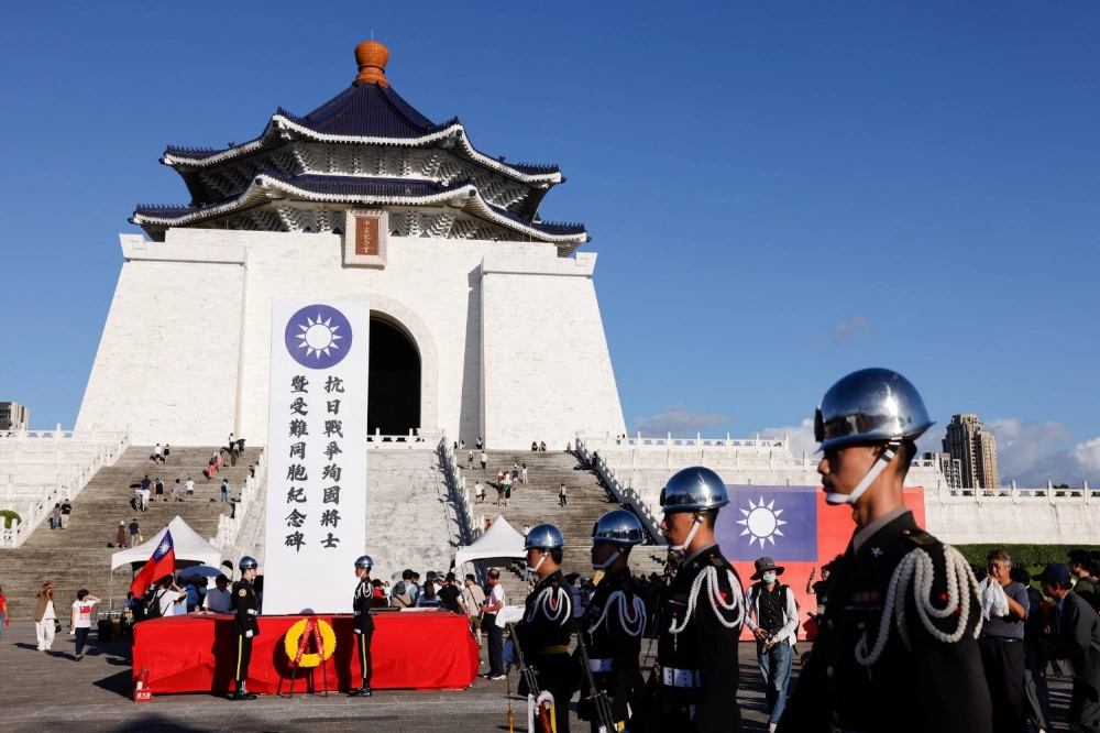 A wreath lies in front of Chiang Kai-shek Memorial Hall during an event to commemorate the 80th anniversary of the end of World War II in Taipei on Aug. 16. A wreath lies in front of Chiang Kai-shek Memorial Hall during an event to commemorate the 80th anniversary of the end of World War II in Taipei on Aug. 16.