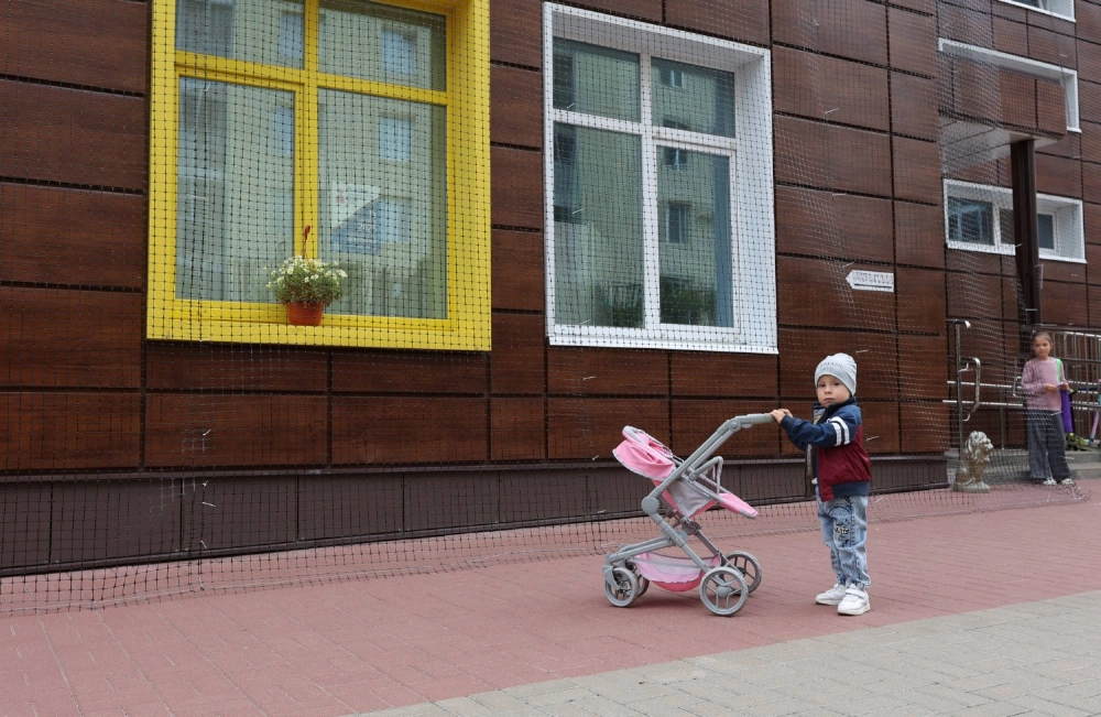Children stand near a nursery in Belgorod, Russia, on Aug. 26. Children stand near a nursery in Belgorod, Russia, on Aug. 26.