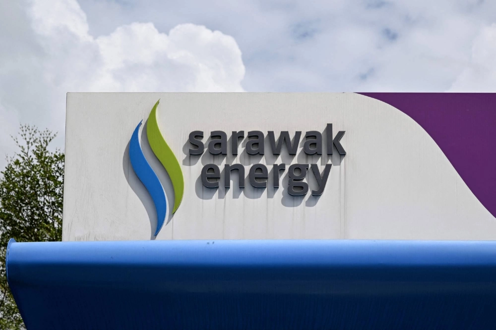 The Sarawak Energy logo at an electric vehicle charging station in Kuching on the island of Borneo. Malaysia's verdant, river-crossed state of Sarawak is charging ahead with plans to become a regional "green battery," but its renewable energy dreams could come at serious environmental cost, experts warn. The Sarawak Energy logo at an electric vehicle charging station in Kuching on the island of Borneo. Malaysia's verdant, river-crossed state of Sarawak is charging ahead with plans to become a regional "green battery," but its renewable energy dreams could come at serious environmental cost, experts warn.