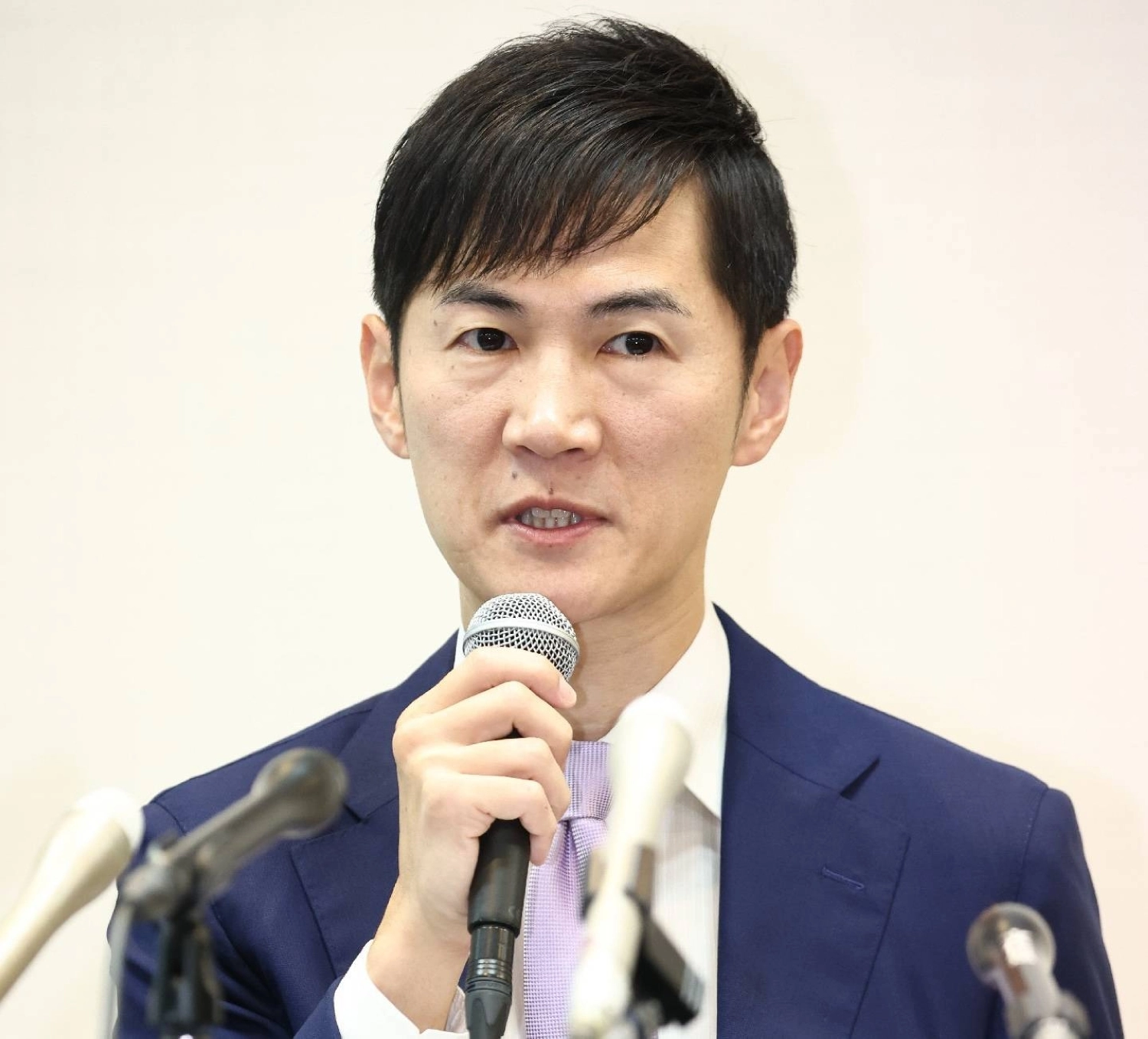 Shinji Ishimaru, leader of The Path to Rebirth party, holds a news conference in August in Tokyo. Shinji Ishimaru, leader of The Path to Rebirth party, holds a news conference in August in Tokyo.