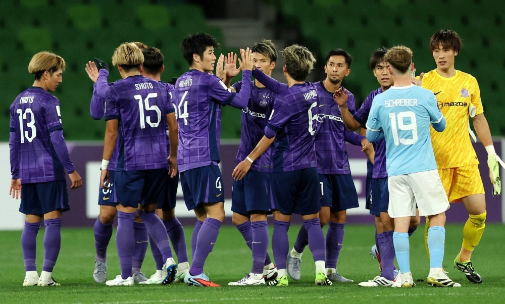 Sanfrecce players celebrate after their Asian Champions League Elite win over Melbourne City on Tuesday.  Sanfrecce players celebrate after their Asian Champions League Elite win over Melbourne City on Tuesday.
