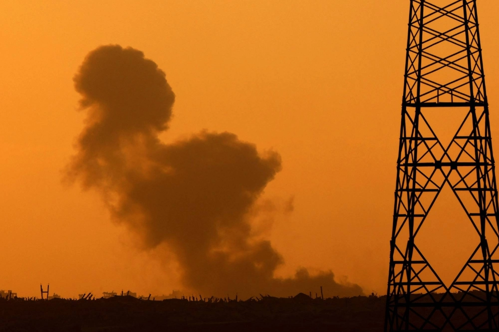 Smoke billows skyward during an Israeli strike on the besieged Palestinian territory on Wednesday. Smoke billows skyward during an Israeli strike on the besieged Palestinian territory on Wednesday.