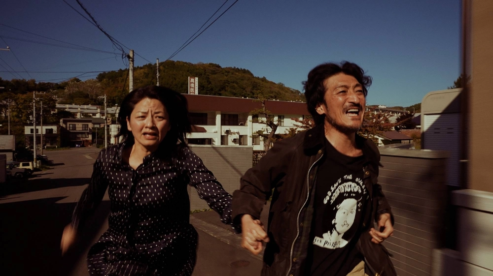 In “Ranshima Bound,” Yoshio (Tomoki Kimura, right) returns to his Hokkaido hometown with his supposed wife (Yuko Kii) when his estranged brother tells him their mother is in a coma.  In “Ranshima Bound,” Yoshio (Tomoki Kimura, right) returns to his Hokkaido hometown with his supposed wife (Yuko Kii) when his estranged brother tells him their mother is in a coma.
