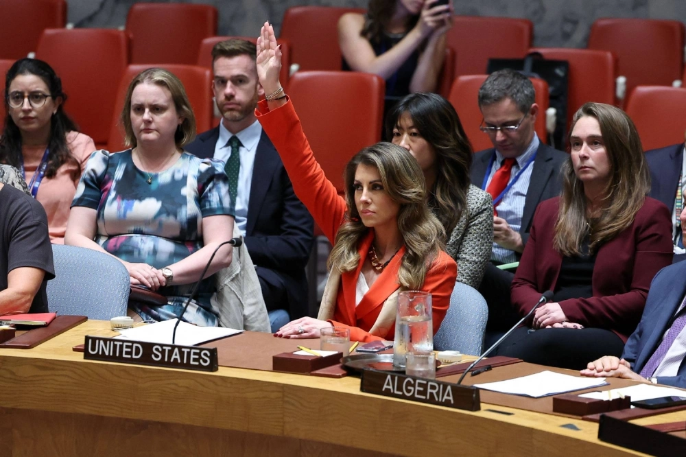 U.S. deputy Middle East envoy Morgan Ortagus raises her hand to veto a draft resolution during a United Nations Security Council meeting on the situation in the Gaza Strip, at the United Nations Headquarters in New York on Thursday. U.S. deputy Middle East envoy Morgan Ortagus raises her hand to veto a draft resolution during a United Nations Security Council meeting on the situation in the Gaza Strip, at the United Nations Headquarters in New York on Thursday.