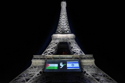 Images of Palestinian (left) and Israeli (right) flags projected onto the Eiffel Tower on the eve of France's planned recognition of the State of Palestine, in Paris, on Sunday. That same day, Britain, Australia, Canada and Portugal recognized a Palestinian state. Images of Palestinian (left) and Israeli (right) flags projected onto the Eiffel Tower on the eve of France's planned recognition of the State of Palestine, in Paris, on Sunday. That same day, Britain, Australia, Canada and Portugal recognized a Palestinian state.