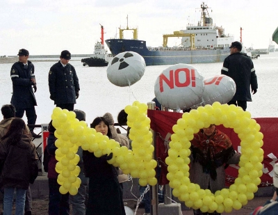 Demonstrators protest at the port of Mutsu-Ogawara in Rokkasho, Aomori Prefecture, in March 1997, as a British freighter arrives with processed nuclear waste, whose fissile elements can be 
fabricated into new nuclear mixed-oxide fuel.  Demonstrators protest at the port of Mutsu-Ogawara in Rokkasho, Aomori Prefecture, in March 1997, as a British freighter arrives with processed nuclear waste, whose fissile elements can be 
fabricated into new nuclear mixed-oxide fuel.