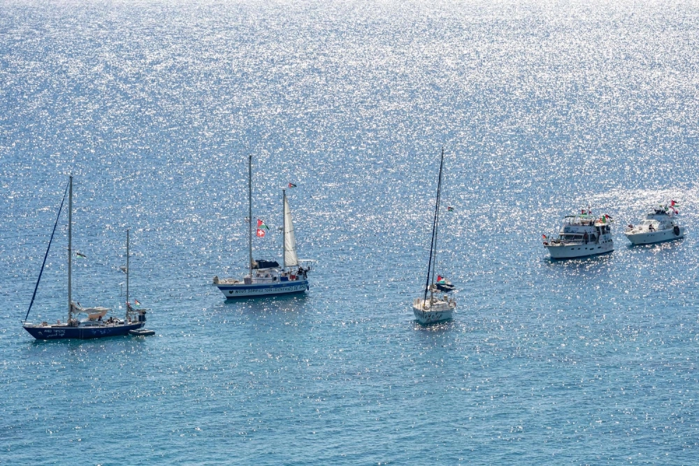 A group of ships of the Global Sumud Flotilla to Gaza are shown moored at the small island of Koufonisi, south of the island of Crete, on Sept. 26 A group of ships of the Global Sumud Flotilla to Gaza are shown moored at the small island of Koufonisi, south of the island of Crete, on Sept. 26