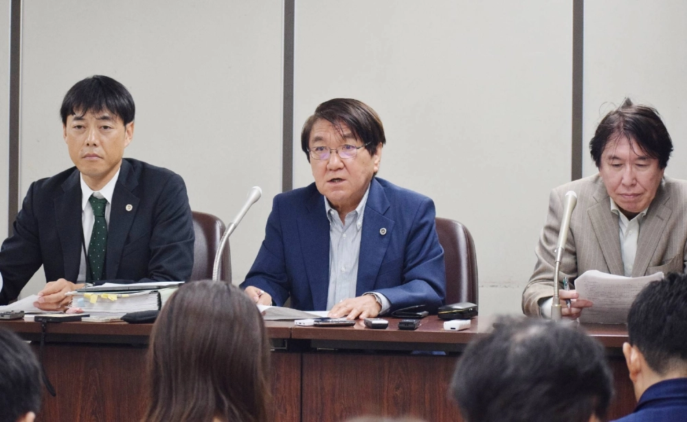 Lawyers representing three former followers of the Unification Church speak during a news conference in Tokyo on Thursday after the followers reached settlements with the group to refund the donations they made. Lawyers representing three former followers of the Unification Church speak during a news conference in Tokyo on Thursday after the followers reached settlements with the group to refund the donations they made.