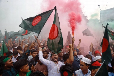 Bangladeshis celebrate in Dhaka on Aug. 5, the first anniversary of student-led protests that ousted former Prime Minister Sheikh Hasina.  Bangladeshis celebrate in Dhaka on Aug. 5, the first anniversary of student-led protests that ousted former Prime Minister Sheikh Hasina.