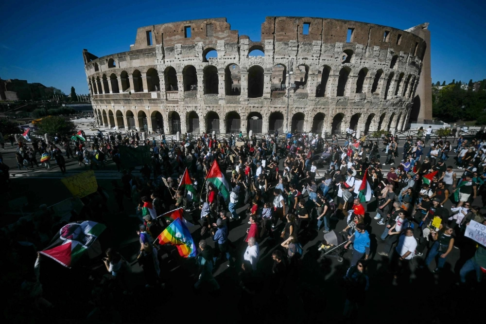 Pro-Palestinian demonstrators march past the Colosseum as they take part in a protest in support of the Palestinian people and against Israel's interception of the Global Sumud flotilla, in Rome on Saturday. Pro-Palestinian demonstrators march past the Colosseum as they take part in a protest in support of the Palestinian people and against Israel's interception of the Global Sumud flotilla, in Rome on Saturday.