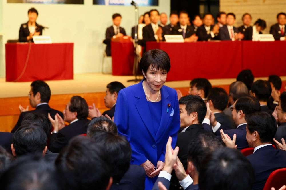 Newly elected Liberal Democratic Party leader Sanae Takaichi is applauded after winning the party's leadership election in Tokyo on Saturday. Newly elected Liberal Democratic Party leader Sanae Takaichi is applauded after winning the party's leadership election in Tokyo on Saturday.