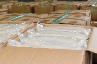 Rice that was about to be illegally imported, seized at the container inspection center of the Osaka Customs Nanko Branch Office on Aug. 8 in Osaka Prefecture | JIJI
