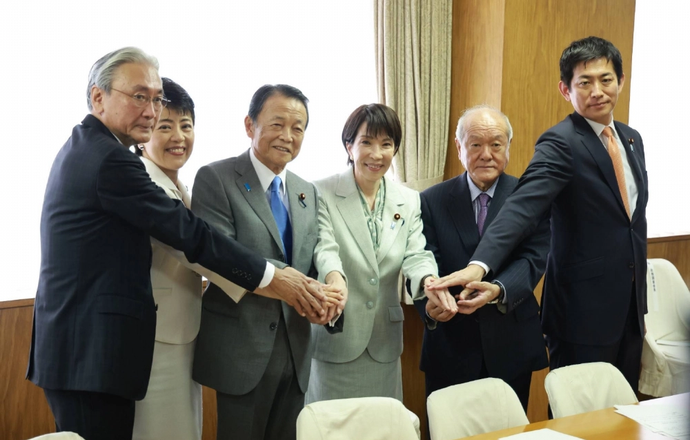 The LDP's newly-appointed election chief Keiji Furuya (far left), general affairs council chair Haruko Arimura (second from left), vice president Taro Aso (center left), president Sanae Takaichi (center right), secretary-general Shunichi Suzuki (second from right) and policy chief Takayuki Kobayashi in Tokyo on Tuesday. The LDP's newly-appointed election chief Keiji Furuya (far left), general affairs council chair Haruko Arimura (second from left), vice president Taro Aso (center left), president Sanae Takaichi (center right), secretary-general Shunichi Suzuki (second from right) and policy chief Takayuki Kobayashi in Tokyo on Tuesday.