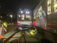 A not-in-service train is seen derailed early Monday morning after colliding with a passenger train late Sunday at Kajigaya Station on Tokyu Railways' Den-en-toshi Line in Kawasaki. | TOKYU RAILWAYS / VIA JIJI