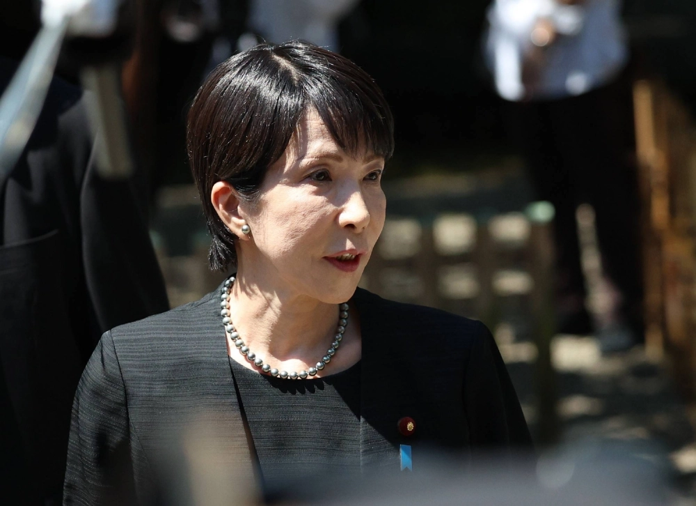 Sanae Takaichi speaks to reporters on Aug. 15, the 80th anniversary of Japan's surrender in World War II, following her visit to Yasukuni Shrine in Tokyo. Sanae Takaichi speaks to reporters on Aug. 15, the 80th anniversary of Japan's surrender in World War II, following her visit to Yasukuni Shrine in Tokyo.