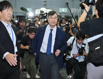 Shimon Sakaguchi, an immunologist and a distinguished professor of the University of Osaka, arrives for a news conference Monday night after winning the 2025 Nobel Prize in medicine, in Suita, Osaka Prefecture. Shimon Sakaguchi, an immunologist and a distinguished professor of the University of Osaka, arrives for a news conference Monday night after winning the 2025 Nobel Prize in medicine, in Suita, Osaka Prefecture.