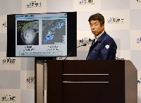 Shuichi Tachihara, director of the forecast division at the Japan Meteorological Agency, holds a news conference regarding the special warnings for heavy rain and high waves due to the approach of Typhoon Halong, on Wednesday at the agency's office in Tokyo. | JIJI
