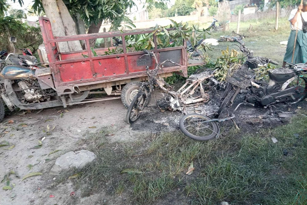 Damage to vehicles at the site of a military strike on a protest in central Myanmar's Chaung U township is seen on Wednesday. Damage to vehicles at the site of a military strike on a protest in central Myanmar's Chaung U township is seen on Wednesday.