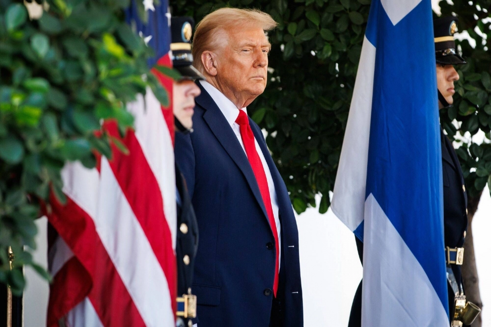 U.S. President Donald Trump outside the White House in Washington on Thursday. Trump has suggested that Spain could be removed from NATO over defense spending. U.S. President Donald Trump outside the White House in Washington on Thursday. Trump has suggested that Spain could be removed from NATO over defense spending.