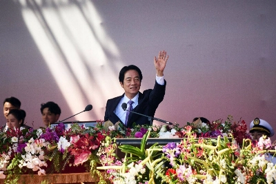 Taiwan President Lai Ching-te speaks during National Day celebrations in Taipei on Friday.  Taiwan President Lai Ching-te speaks during National Day celebrations in Taipei on Friday.