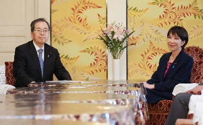 LDP leader Sanae Takaichi and Komeito leader Tetsuo Saito attend a party leaders' meeting on Friday in Tokyo. LDP leader Sanae Takaichi and Komeito leader Tetsuo Saito attend a party leaders' meeting on Friday in Tokyo.