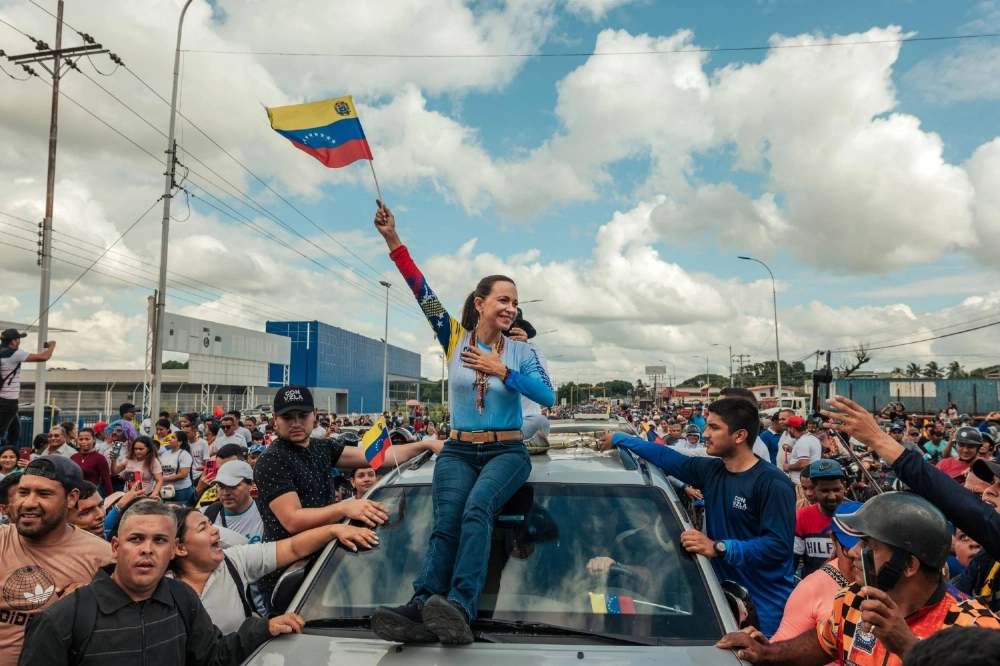 Venezuelan opposition leader, Maria Corina Machado greets supporters during a rally in Guanare, Venezuela, in July 2024.  Venezuelan opposition leader, Maria Corina Machado greets supporters during a rally in Guanare, Venezuela, in July 2024.