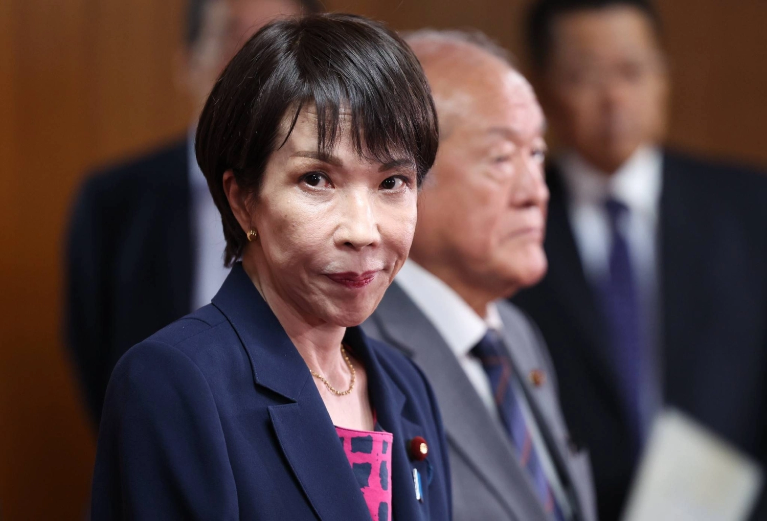 New Liberal Democratic Party President Sanae Takaichi speaks to reporters at party headquarters in Tokyo after a meeting with Komeito leadership on Friday. New Liberal Democratic Party President Sanae Takaichi speaks to reporters at party headquarters in Tokyo after a meeting with Komeito leadership on Friday.