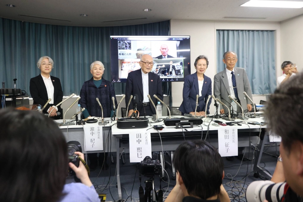Representatives from Nihon Hidankyo, formally known as the Japan Confederation of A- and H-Bomb Sufferers Organizations, speak during a news conference in Tokyo in October last year after winning the Nobel Peace Prize. Representatives from Nihon Hidankyo, formally known as the Japan Confederation of A- and H-Bomb Sufferers Organizations, speak during a news conference in Tokyo in October last year after winning the Nobel Peace Prize.