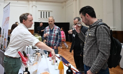 Participants sample sake at an event in London on Friday. Participants sample sake at an event in London on Friday.