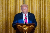 U.S. President Donald Trump speaks during a dinner in the East Room of the White House in Washington on Wednesday. | Bloomberg