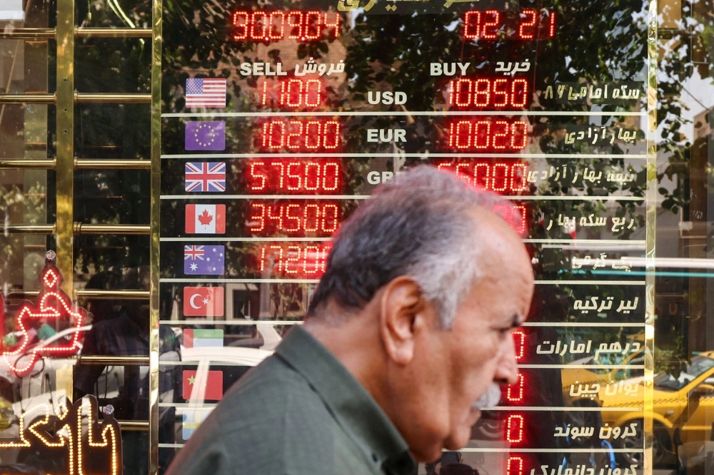 An electronic board displaying currency exchange rates in Ferdowsi Square in Tehran on Sept. 28. The rial has shriveled to 1,115,000 per dollar from 920,000 in August, stoking inflation to at least 40% and gutting purchasing power. An electronic board displaying currency exchange rates in Ferdowsi Square in Tehran on Sept. 28. The rial has shriveled to 1,115,000 per dollar from 920,000 in August, stoking inflation to at least 40% and gutting purchasing power.