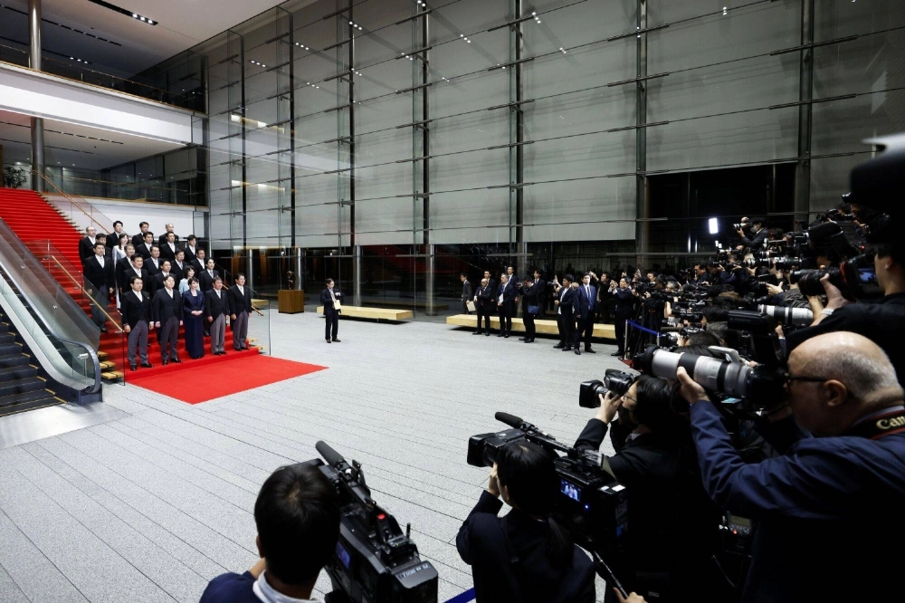 Sanae Takaichi's new Cabinet poses for a group photo at the Prime Minister's Office on Tuesday. Sanae Takaichi's new Cabinet poses for a group photo at the Prime Minister's Office on Tuesday.
