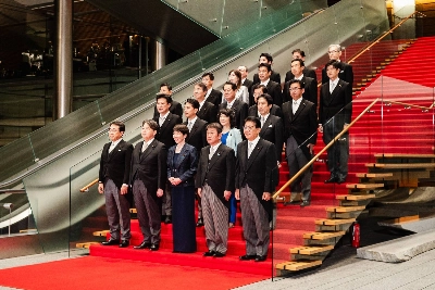 Prime Minister Sanae Takaichi poses with members of the newly formed Cabinet on Tuesday night. Prime Minister Sanae Takaichi poses with members of the newly formed Cabinet on Tuesday night.