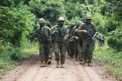 Japan's Ground Self-Defense Force personnel march during the joint multinational exercise Garuda Shield 2025 at the Baturaja combat training center in Lampung, Indonesia, last month. Japan's Ground Self-Defense Force personnel march during the joint multinational exercise Garuda Shield 2025 at the Baturaja combat training center in Lampung, Indonesia, last month.