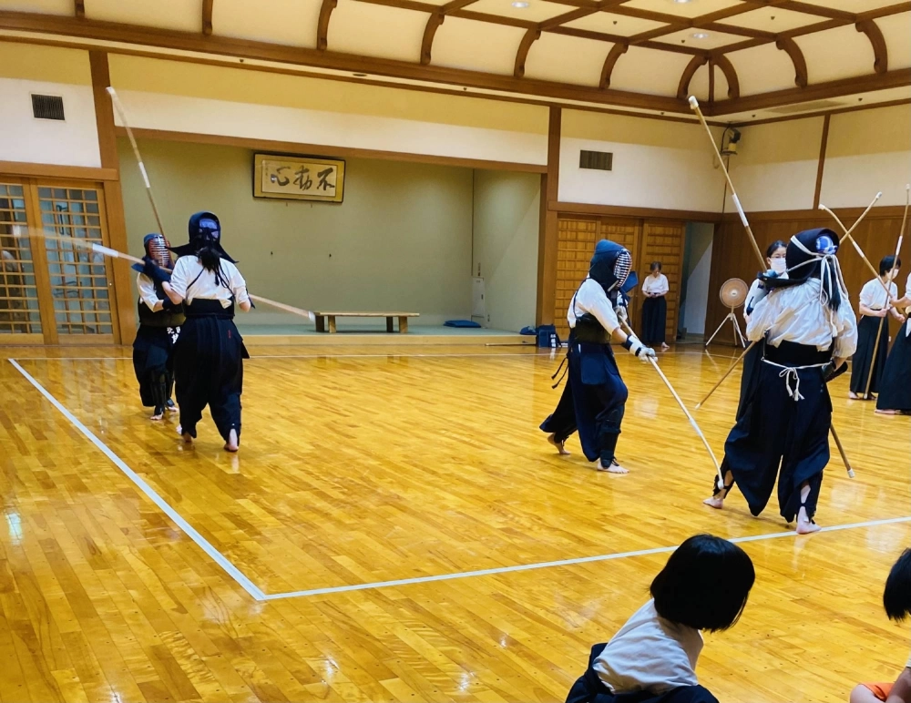 The traditional naginata is a long wooden pole with a curved blade at the end. Though the naginata used in the dojo were entirely bamboo, they nonetheless made for striking displays of power and agility. The traditional naginata is a long wooden pole with a curved blade at the end. Though the naginata used in the dojo were entirely bamboo, they nonetheless made for striking displays of power and agility.