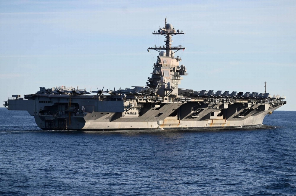 The USS Gerald R. Ford, the world's largest aircraft carrier, seen in the North Sea during NATO Neptune Strike 2025 exercise on Sept. 24. Washington is deploying an aircraft carrier and accompanying ships to counter drug-trafficking organizations in Latin America, the Pentagon said Friday. The USS Gerald R. Ford, the world's largest aircraft carrier, seen in the North Sea during NATO Neptune Strike 2025 exercise on Sept. 24. Washington is deploying an aircraft carrier and accompanying ships to counter drug-trafficking organizations in Latin America, the Pentagon said Friday.