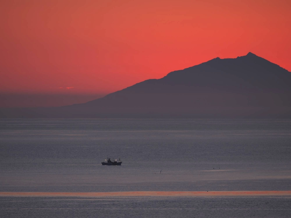 Kunashiri Island is seen across the Nemuro Strait, just before sunrise from Rausu, Hokkaido. A strong earthquake struck the area at a depth of about 40 kilometers early Saturday. Kunashiri Island is seen across the Nemuro Strait, just before sunrise from Rausu, Hokkaido. A strong earthquake struck the area at a depth of about 40 kilometers early Saturday.