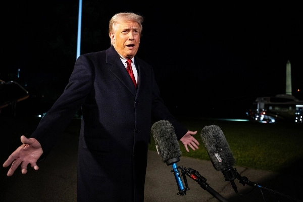 U.S. President Donald Trump speaks to members of the media on the South Lawn of the White House in Washington before boarding Marine One on Friday. U.S. President Donald Trump speaks to members of the media on the South Lawn of the White House in Washington before boarding Marine One on Friday.