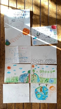 At a workshop in 2023, a group of children were asked to draw how they imagine Japan's climate would be in 50 years.  | COURTESY OF KELVIN TANG
