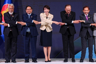 Prime Minister Sanae Takaichi takes a group photo with other leaders of the Association of Southeast Asian Nations during the ASEAN-Japan summit in Kuala Lumpur on Sunday. Prime Minister Sanae Takaichi takes a group photo with other leaders of the Association of Southeast Asian Nations during the ASEAN-Japan summit in Kuala Lumpur on Sunday.